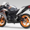 Honda CBR125R 2011 orange silver back